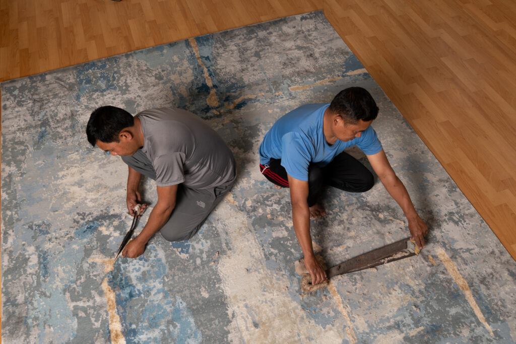 Hand knotted rug pile damage from beater bar