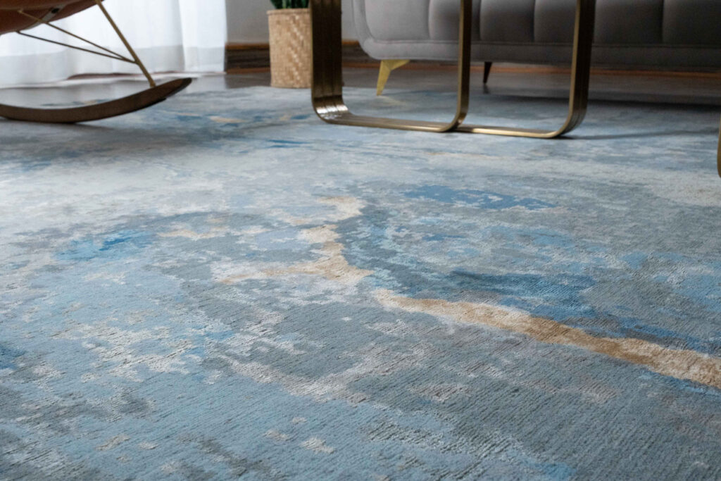 Custom hand knotted rug in luxury hotel lobby Nepal manufacturer